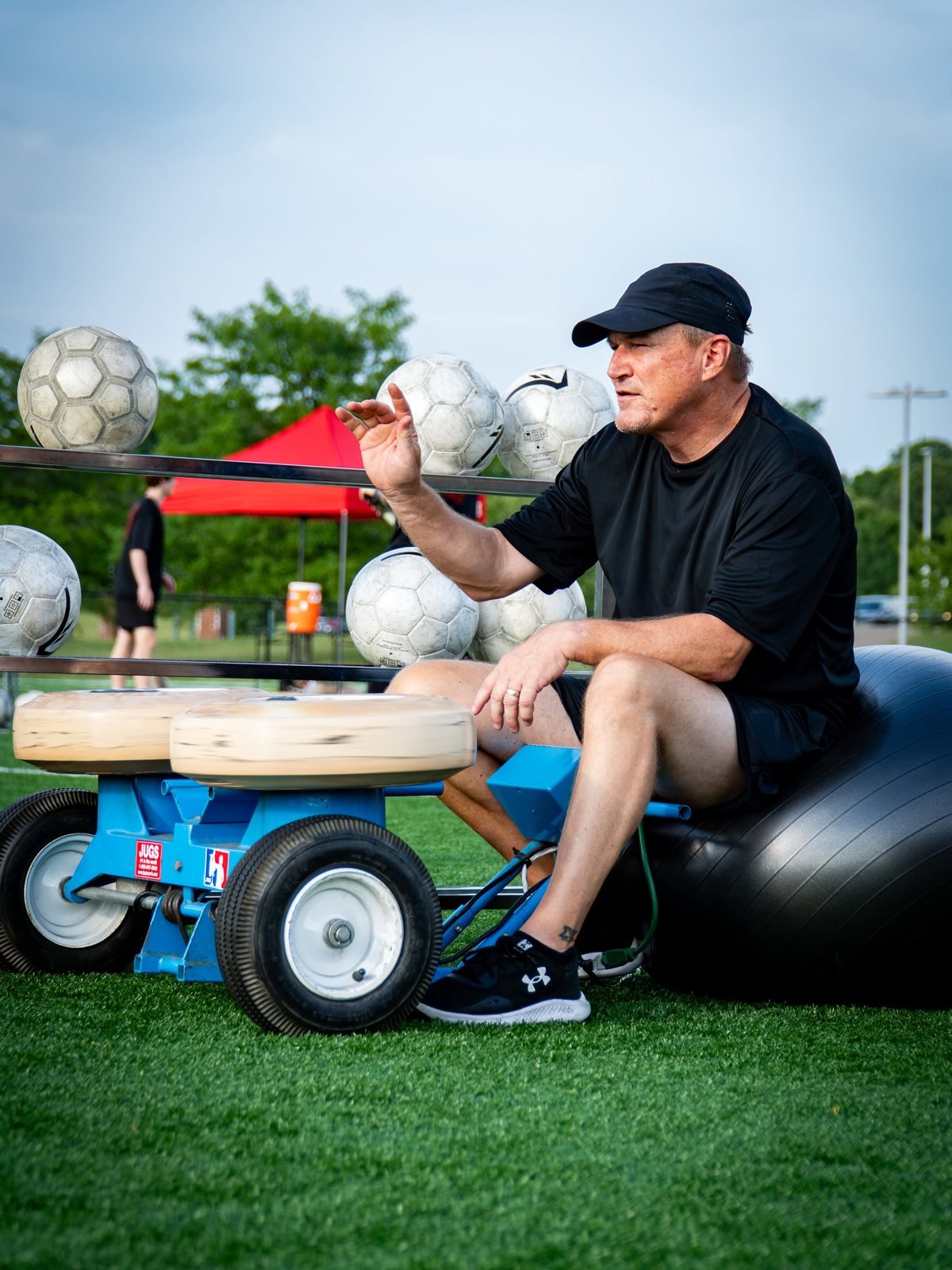 John Congrove coaching on the field at The Keeper Academy
